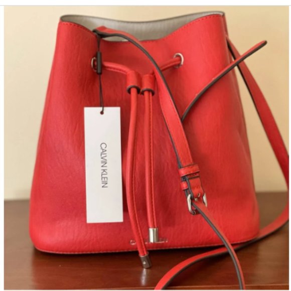 Calvin Klein Handbags - BNWT Calvin Klein Red Gabrianna Bucket Drawstring
